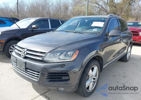 2012 Volkswagen Touareg Tdi Lux z USA, uszkodzony, nr VIN WVGFK9BP7CD002548